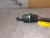 Drivaxel, vänster fram från en Suzuki Ignis (FH) 1.3 16V 2003
