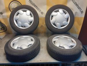 Begagnade Hjuluppsättning + däck Suzuki Swift (SF310/413) 1.3i 16V 5-Drs. Pris € 99,00 Marginaltabell erbjuds av Yellow Parts