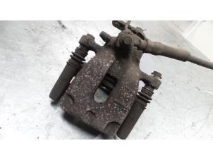 Używane Zacisk hamulcowy lewy tyl Seat Leon (5FB) 1.4 TSI Ecomotive 16V Cena € 60,00 Procedura marży oferowane przez A.T.S. van de Wiel
