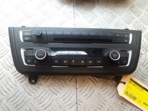 Begagnade Värmekontrollpanel BMW 1 serie (F20) 114d 1.6 16V Pris € 145,00 Marginaltabell erbjuds av Bentie's autodemontage