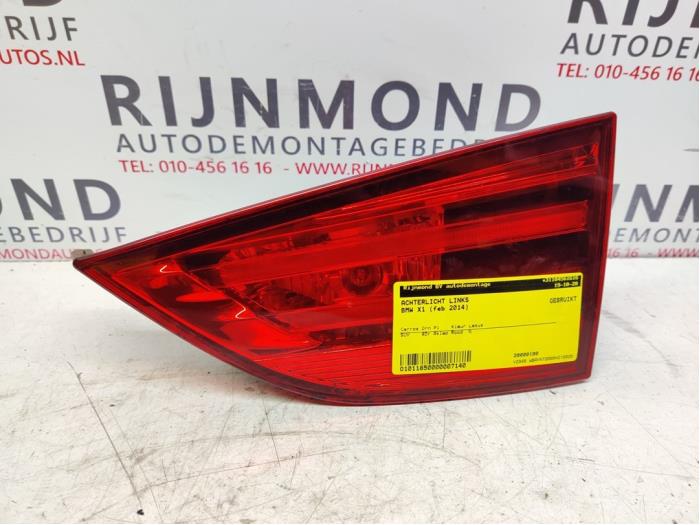 Taillight, left from a BMW X1 (E84) sDrive 20d 2.0 16V 2014