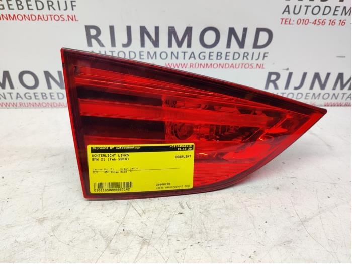 Taillight, left from a BMW X1 (E84) sDrive 20d 2.0 16V 2014