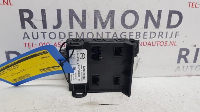 Dator , karosskontroll (BCM) från en Mazda 2 (DJ/DL) 1.5 SkyActiv-G 115 2018