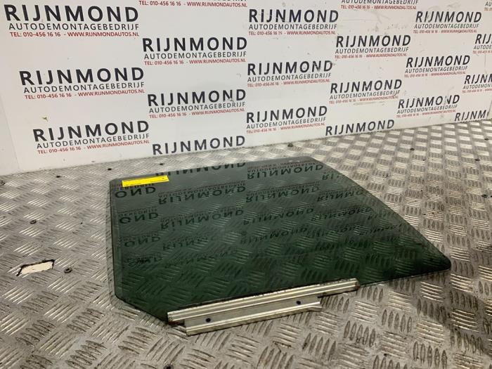 Sidofönster, vänster höger bak från en Opel Agila (B) 1.0 12V 2008