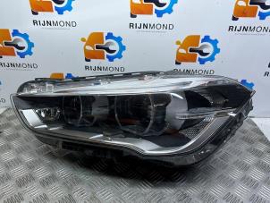 Używane Reflektor lewy BMW X1 (F48) xDrive 20d 2.0 16V Cena € 907,50 Z VAT oferowane przez Autodemontage Rijnmond BV