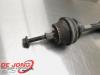Drivaxel, höger fram från en Volkswagen Passat Variant (3B6) 1.9 TDI 130 2004