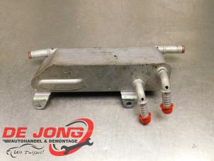 Begagnade Oljekylare Ford Focus 4 1.0 Ti-VCT EcoBoost 12V 125 Pris € 70,00 Marginaltabell erbjuds av Autodemontagebedrijf de Jong