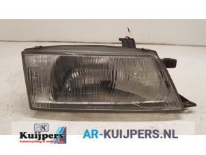 Gebruikte Koplamp rechts Suzuki Baleno (GA/GB) 1.3 GL 16V Prijs € 25,00 Margeregeling aangeboden door Autorecycling Kuijpers