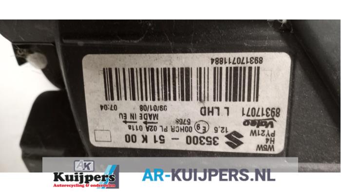 Strålkastare, vänster från en Suzuki Splash  2011