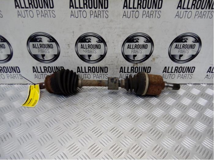 Drivaxel, vänster fram från en MINI Mini (R56) 1.6 16V Cooper S 2008
