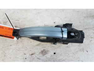 Gebruikte Portiergreep 4Deurs links-voor Ford Focus C-Max 1.8 16V Prijs € 10,00 Margeregeling aangeboden door Autodemontagebedrijf Smit