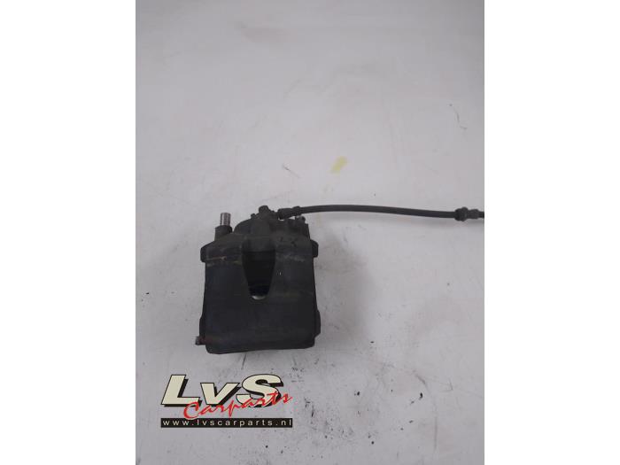 Volkswagen Golf Front brake calliper, left