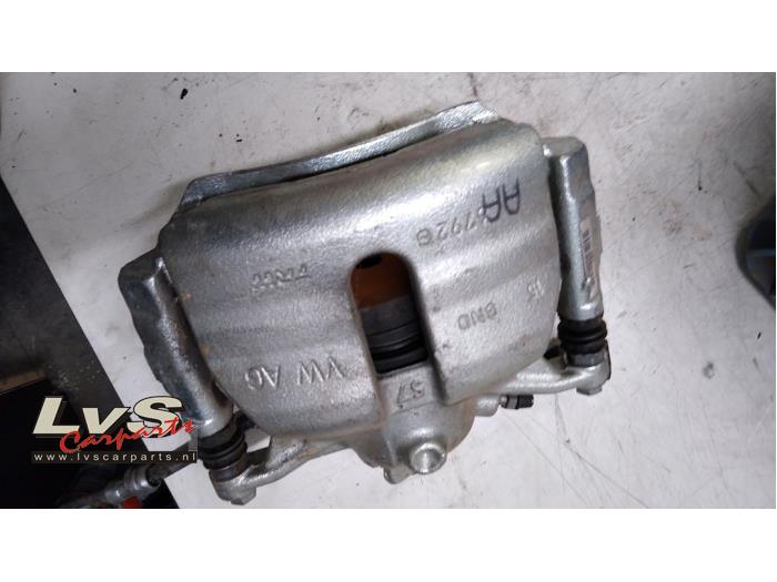 Volkswagen Polo Front brake calliper, left