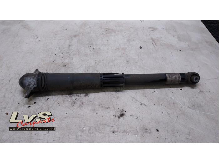 Volkswagen Passat Rear shock absorber, left