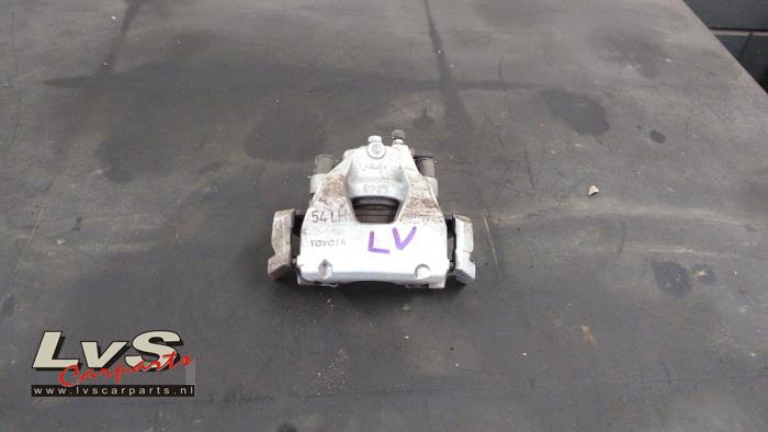 Toyota Yaris Front brake calliper, left
