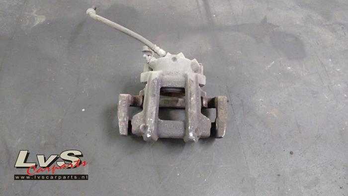 BMW 1-Serie Front brake calliper, left
