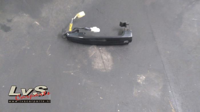 Suzuki SX-4 Door handle 4-door, front left