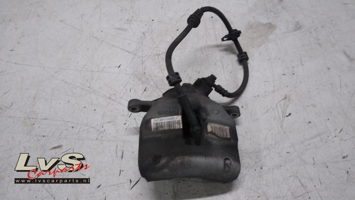 Opel Combo Front brake calliper, left
