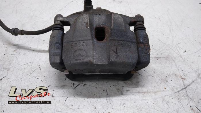 Mazda 6. Bremszange rechts vorne