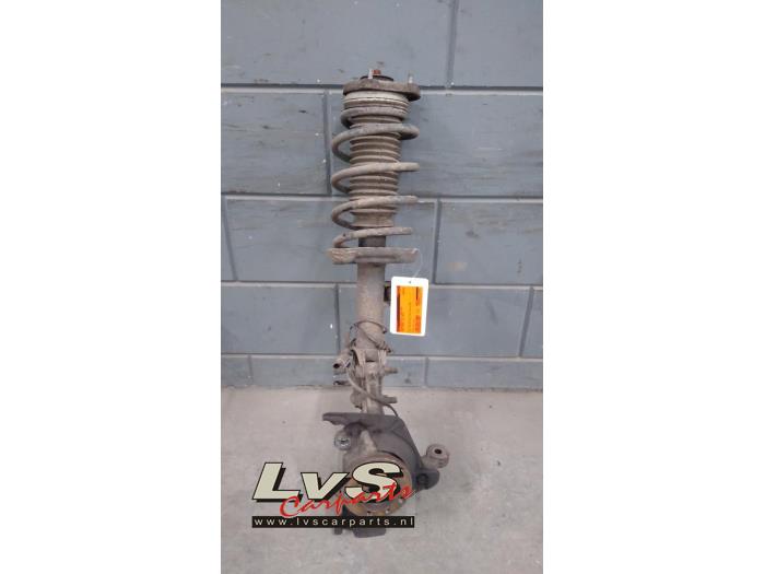 Opel Combo Front shock absorber rod, left