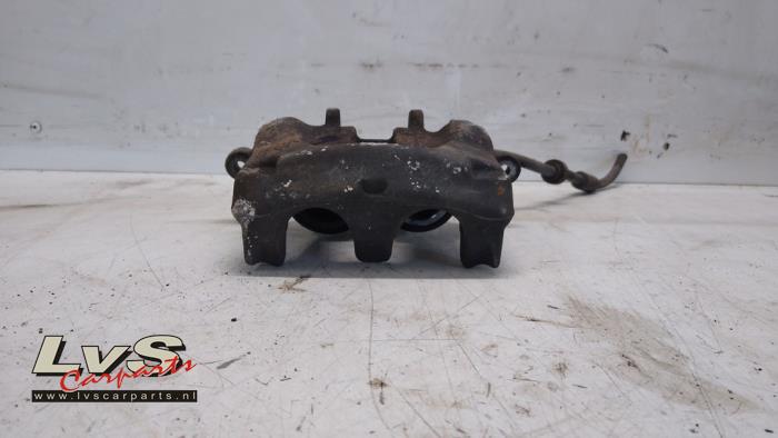 Opel Vivaro Front brake calliper, left