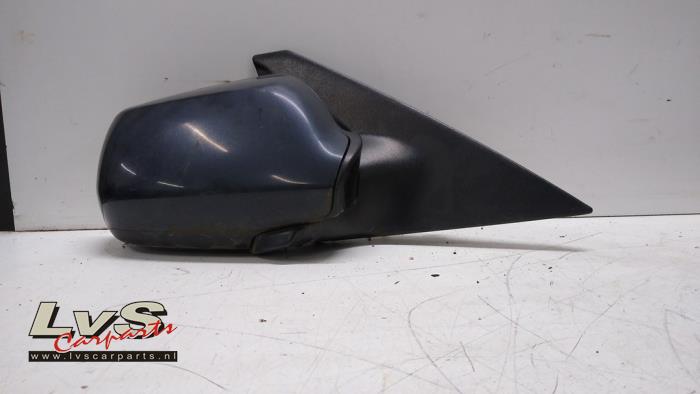 Mazda 3. Rétroviseur extérieur droit