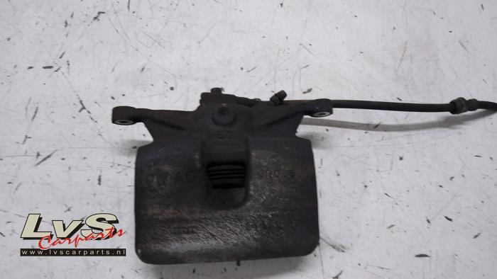 Volkswagen Golf Front brake calliper, left
