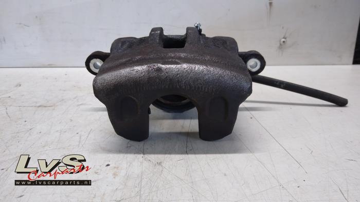 Hyundai IX20 Front brake calliper, left