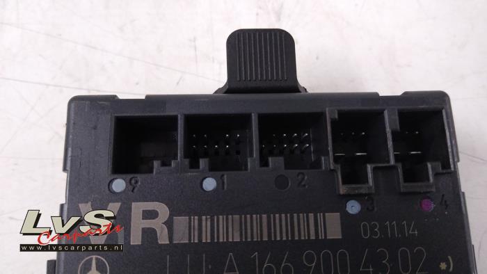 Centrallåsmodul från en Mercedes-Benz A (W176) 1.6 A-180 16V 2014