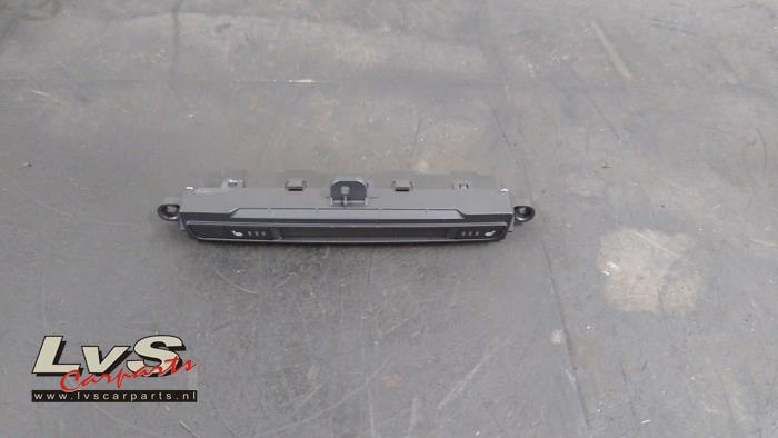 Mazda 2. Commutateur chauffage siège