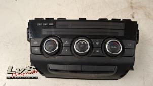 Gebruikte Chaufage Bedieningspaneel Mazda CX-5 I (KE,GH) 2.0 SkyActiv-G 16V 2WD Prijs € 110,00 Margeregeling aangeboden door LvS Carparts