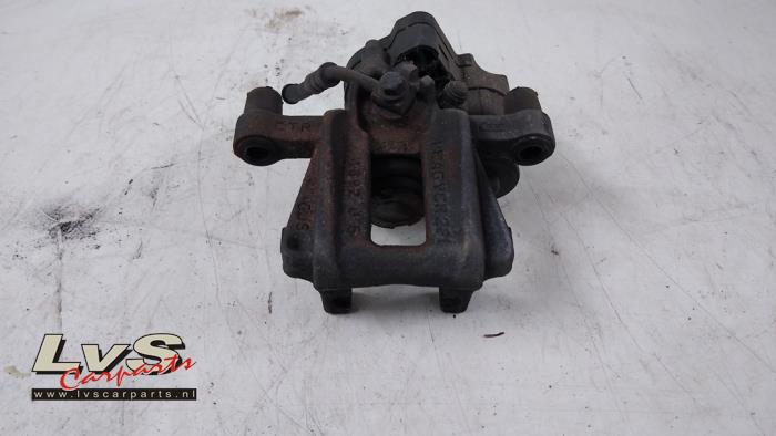 Volkswagen Caddy Bremszange links hinten