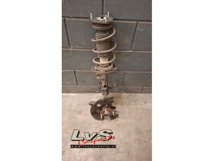 Mazda 2. Front shock absorber rod, right