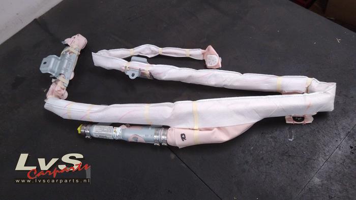 Mazda 2. Airbag plafond droite