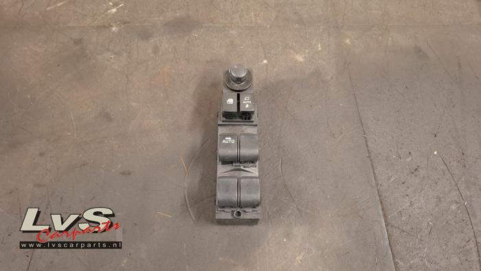 Mazda 2. Electric window switch