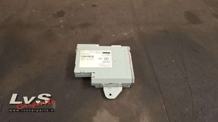 Mazda 2. Unité de contrôle Multimedia