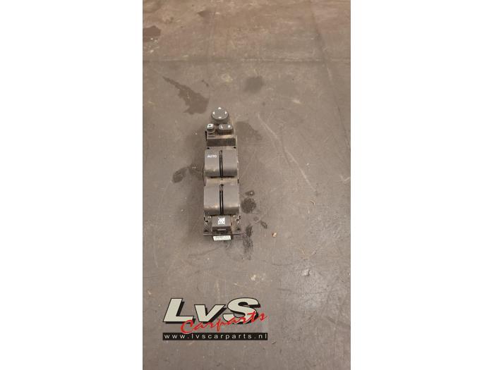 Mazda 2. Commutateur vitre électrique