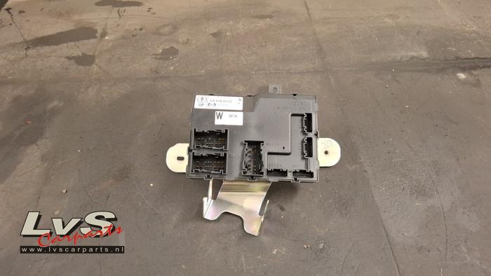 Mazda 2. Module confort