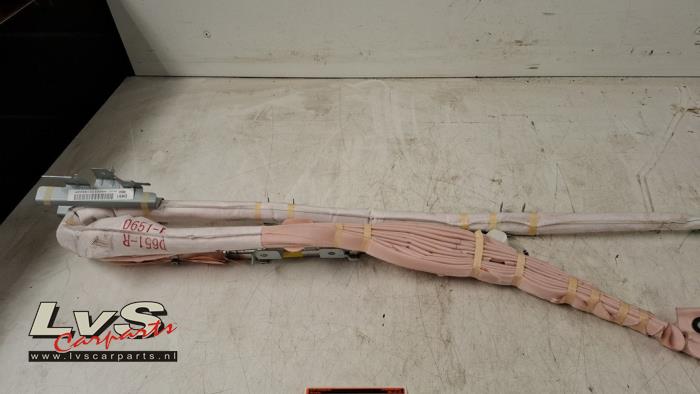 Mazda 2. Airbag plafond droite