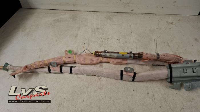 Mazda 2. Airbag plafond gauche