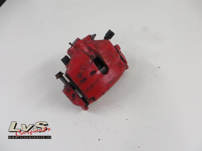 Volkswagen Golf Front brake calliper, left