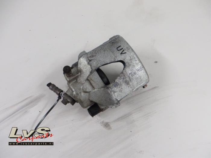 Volkswagen Golf Front brake calliper, left