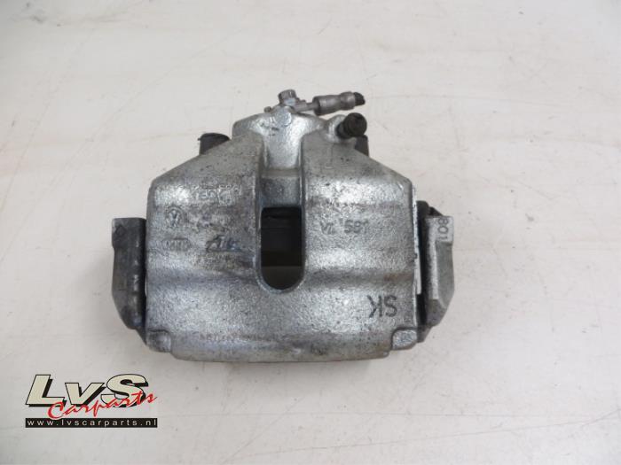 Volkswagen Golf Front brake calliper, left