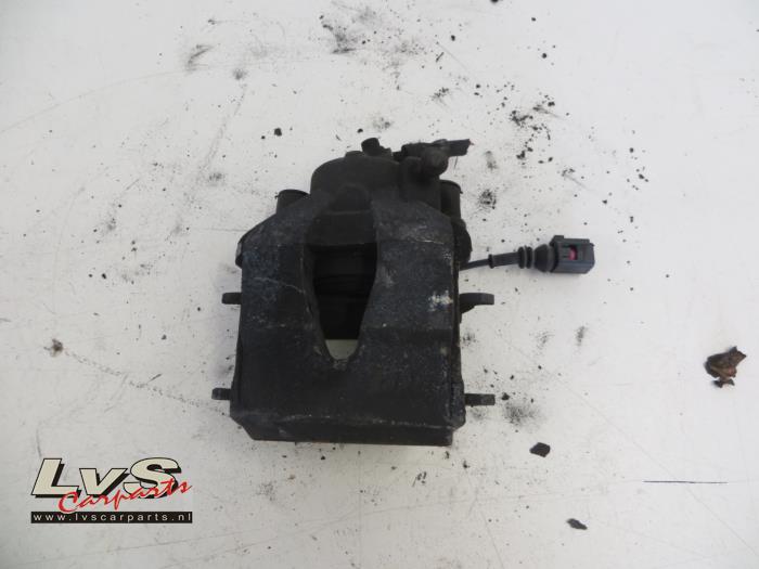 Volkswagen Golf Front brake calliper, left