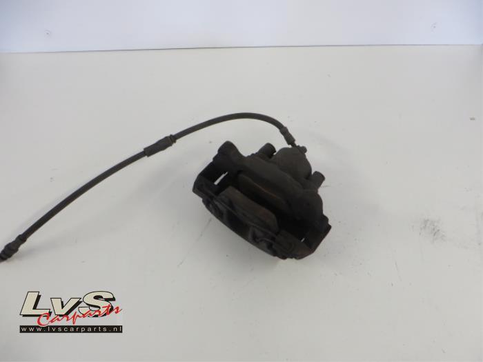 Volkswagen Golf Front brake calliper, left