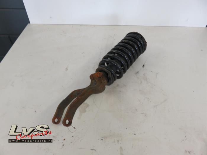 Ssang Yong Rexton Front shock absorber rod, right