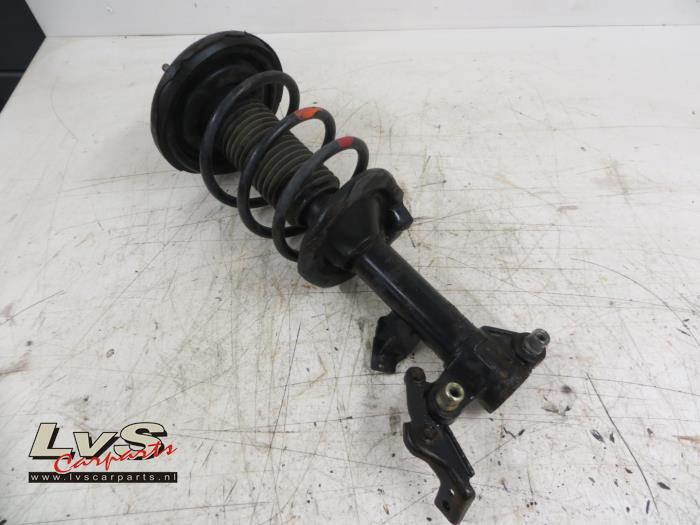 Nissan Primera Fronts shock absorber, left