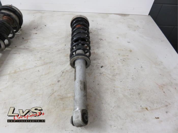 BMW 5-Serie Rear shock absorber, left