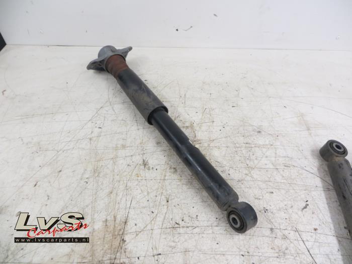 Volkswagen Passat Rear shock absorber, left