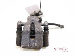 Begagnade Bakre bromsok, höger Opel Corsa E 1.3 CDTi 16V ecoFLEX Pris € 35,00 Marginaltabell erbjuds av Focus Automotive